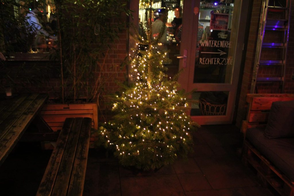A Christmas tree covered in lights