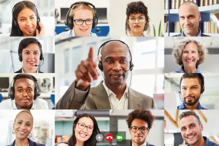 Various genders from many different ethnic background attending an online meeting