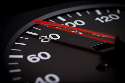 Speedometer showing a dial pointing between 80 and 100 miles (or perhaps kilometers) an hour